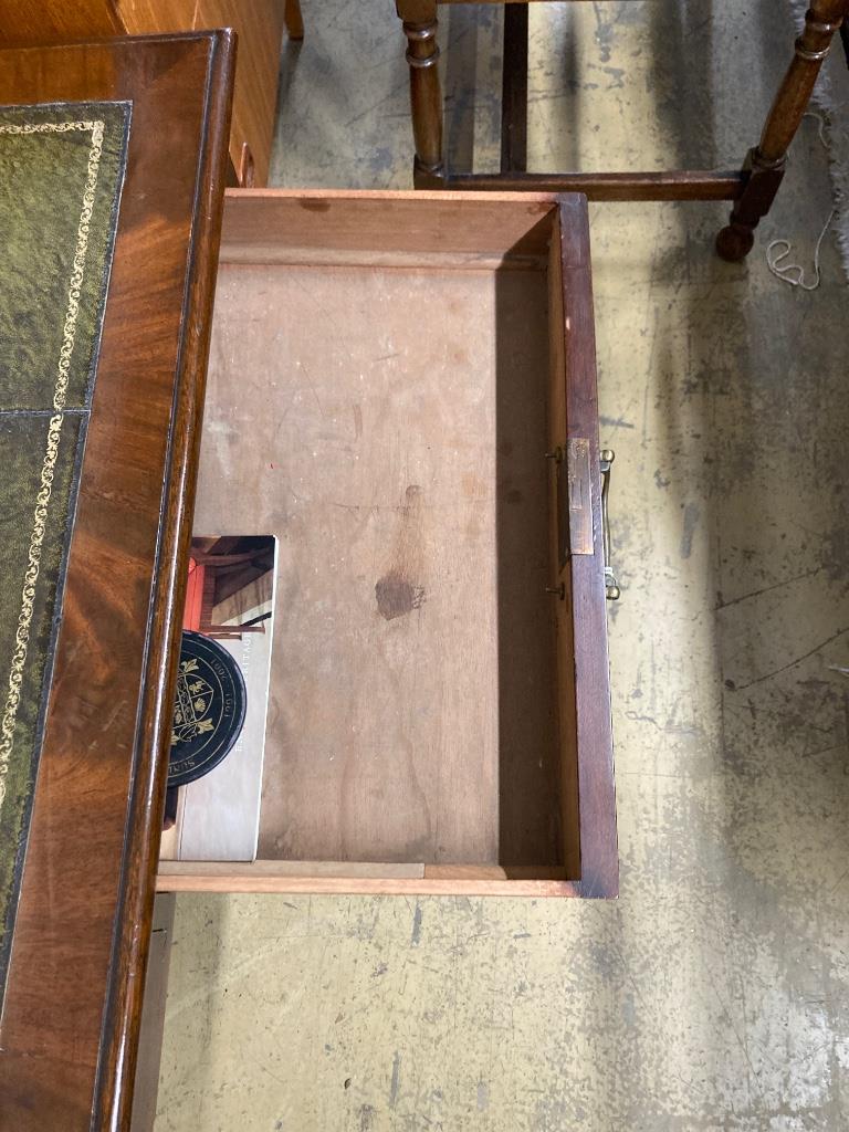 A Victorian mahogany two drawer writing table, length 114cm, depth 58cm, height 73cm